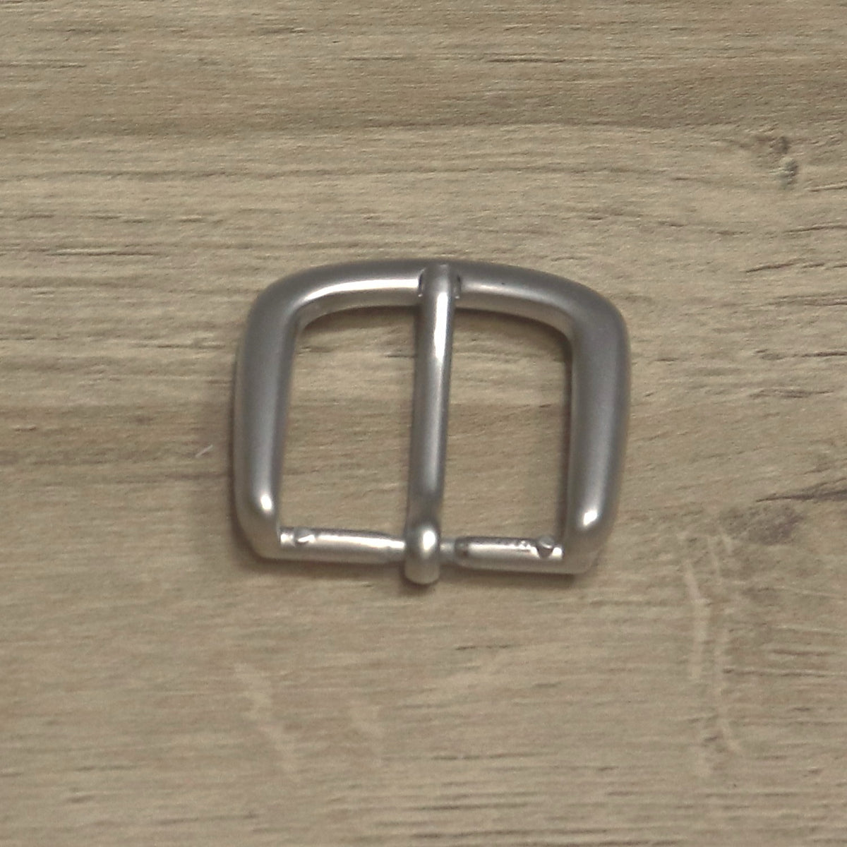 Belt buckle from above with the heel bar at the bottom