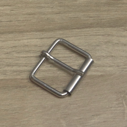 Nickel-plated wire roller buckle at an angle, pin resting on the roller